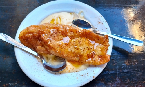 A plate of food with some sauce on it